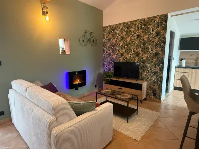 Salon cheminée nid douillet